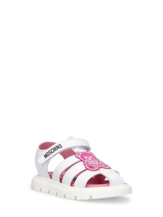 Moschino   Logo print leather sandals w/teddy patch 