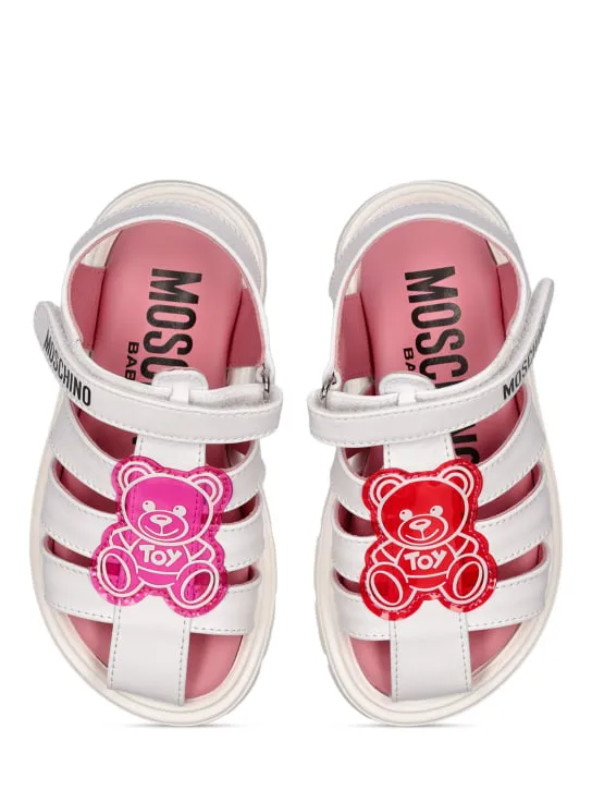 Moschino   Logo print leather sandals w/teddy patch 